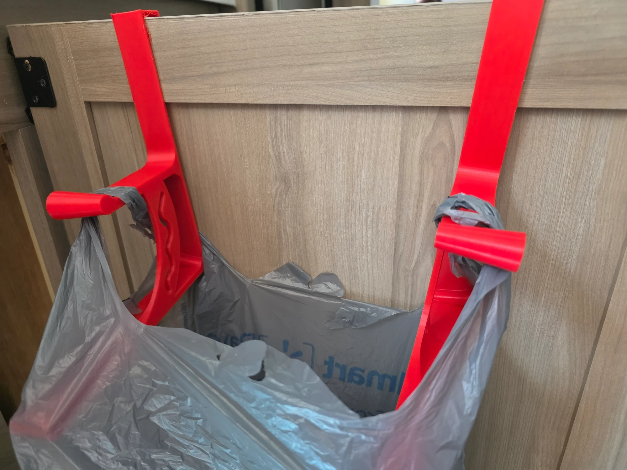 Grocery bag garbage bag holder designed for RV